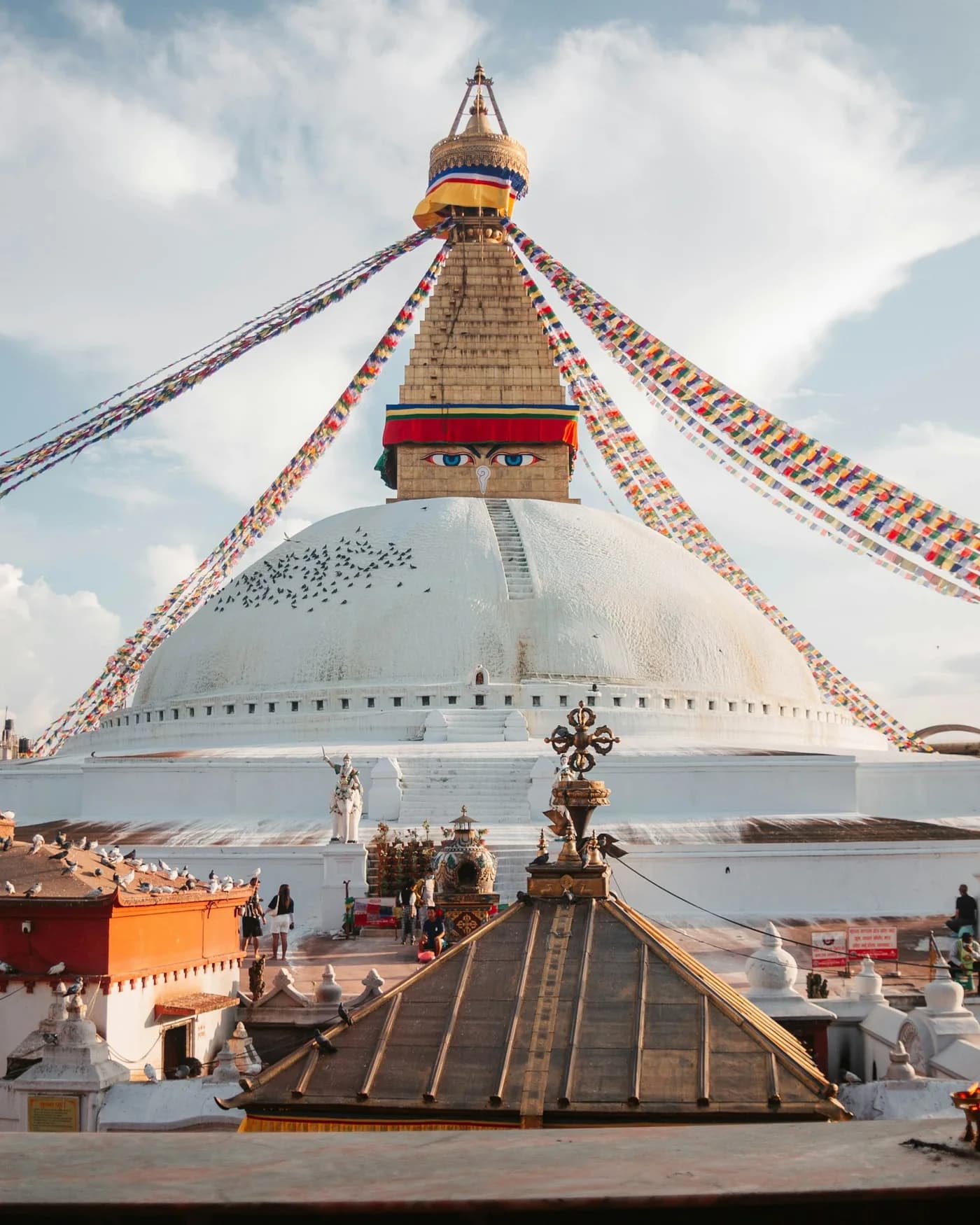 A white stupa beneath the Nepal sky